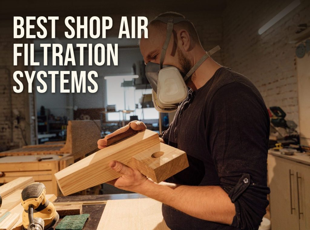 Best shop air filtration systems: a woodworker in a dust respirator sanding a board in a workshop