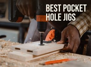 Best pocket hole jig: a woodworker drilling into a board with pocket holes on a workbench