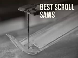 Best scroll saw: close-up of a scroll saw blade and hold-down cutting a curve