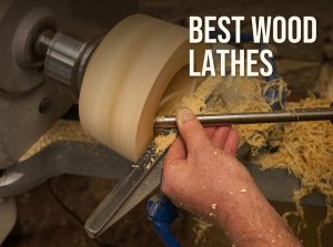 Best wood lathe: a turner shaping a bowl blank on a wood lathe with a gouge