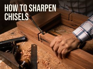 How to sharpen chisels: a woodworker paring a joint with a sharp bench chisel