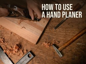 How to use a hand planer: planing a board on a workbench with shavings around it
