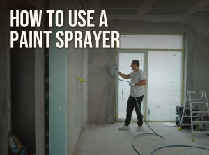 How to use a paint sprayer: spraying an interior wall in a masked room