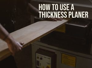 How to use a thickness planer: feeding a board into a benchtop planer
